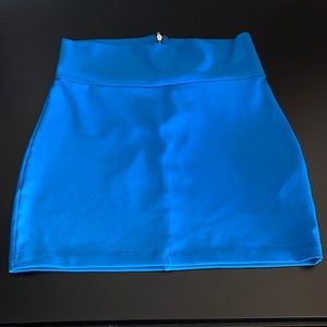 Bebe Strech Mini Skirt- Mykonos Blue